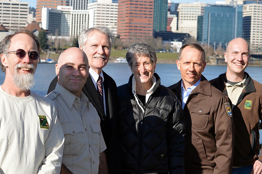 ODFW biologists Paul Scheerer (left) and Brian Bangs (right) on the Willamette Esplanade with Oregon Gov. John Kitzhaber, U.S. Interior Secretary Sally Jewell, and Chris Allen, U.S. Fish and Wildlife Service biologist, and Rollie White, U.S. Fish and Wildlife Service deputy state supervisor. The photo op took place following the announcement that the Oregon chub is the first fish in the United States to achieve “recovered” status under the Endangered Species Act. (Photo by Rick Swart)