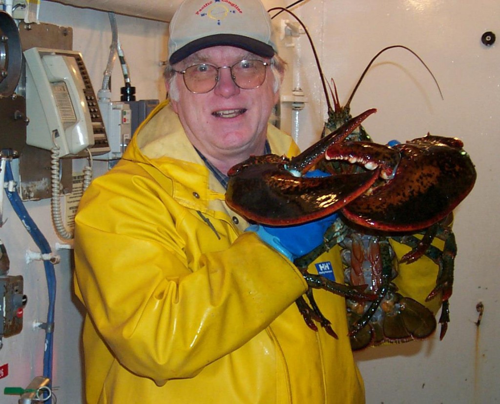 Joseph Kunkel with large American lobster aboard Delaware II, Spring 2003 Leg 4, taken with his camera by a shipmate.