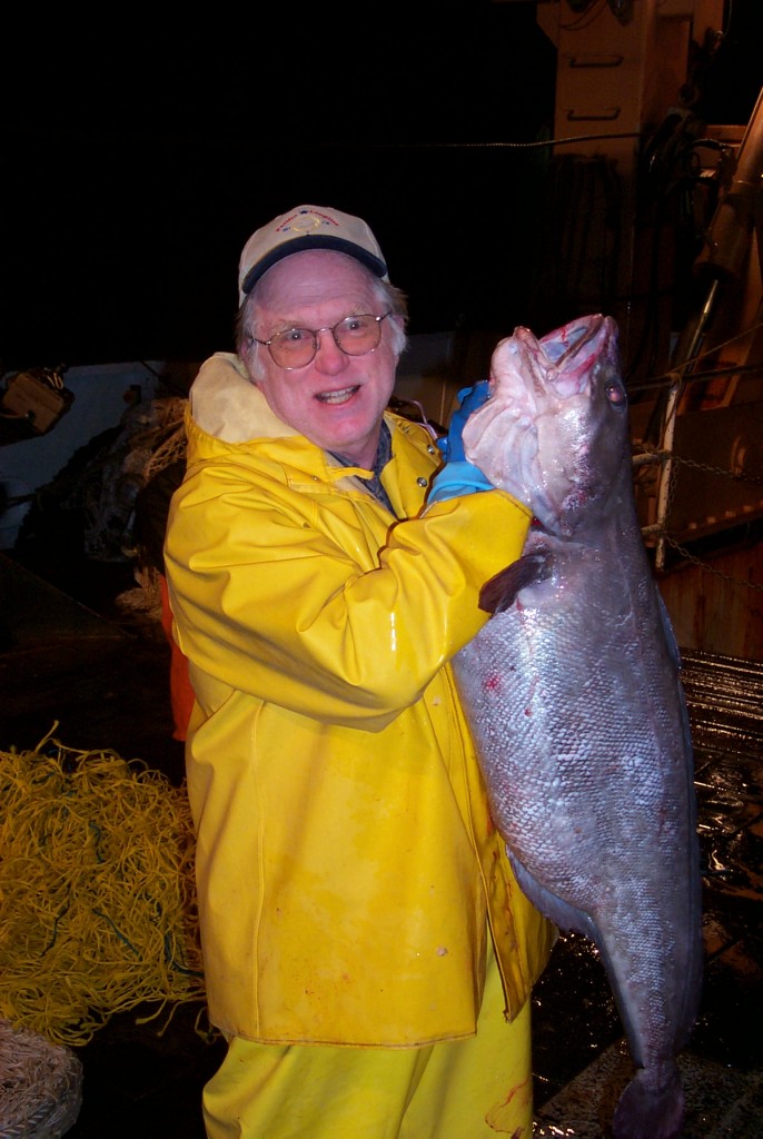 Joseph Kunkel with large White Hake aboard Delaware II, Spring 2003 Leg 4, taken with his camera by a shipmate.