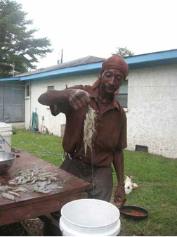 Ronald Goodwine of GGFA shows off his shrimp catch.